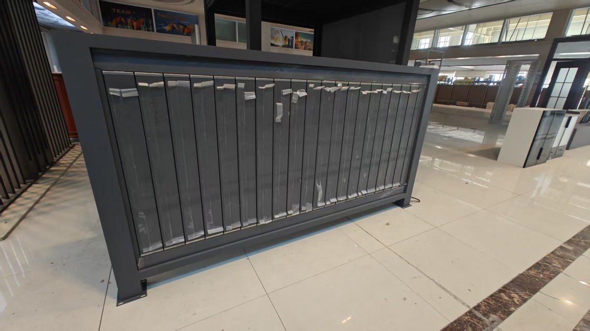 Dark coated aluminum panel sample with closely spaced vertical infill