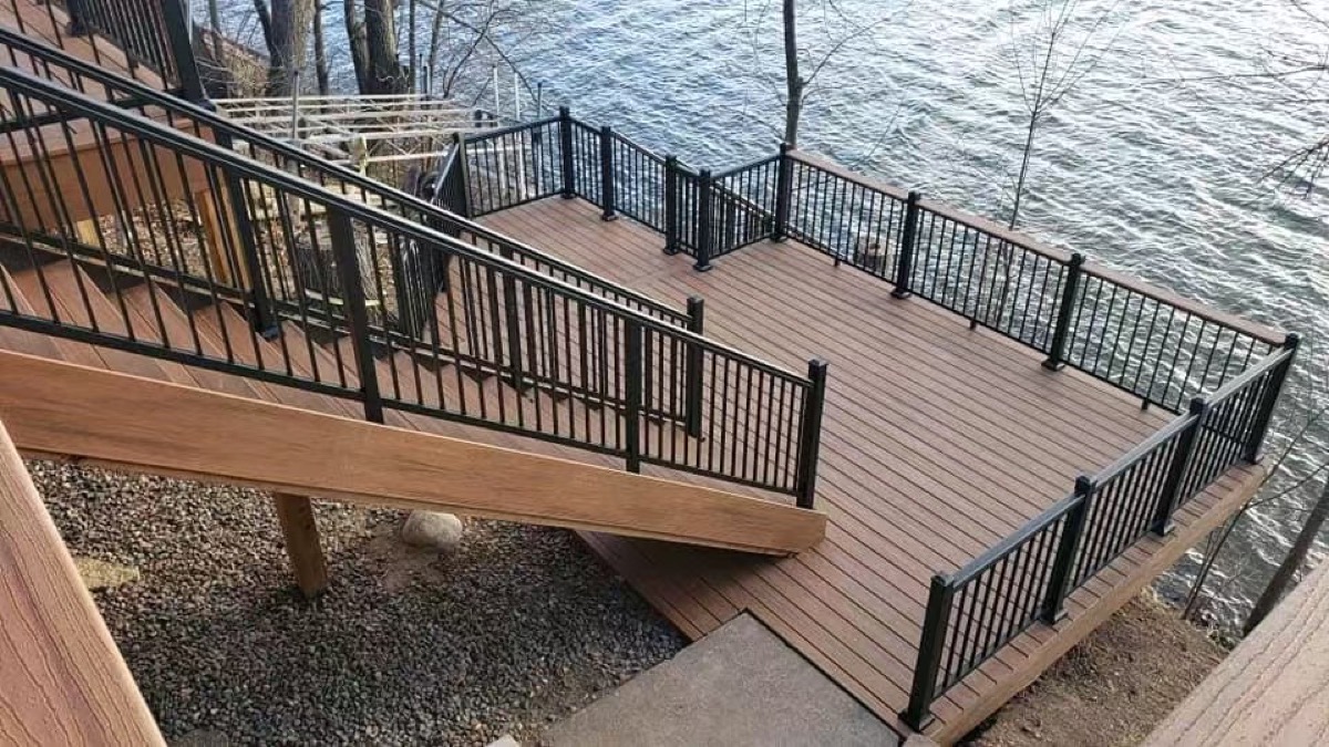 Black railing panels around a waterfront deck